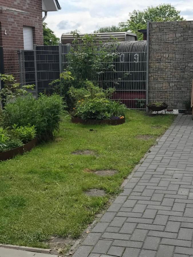Haus Margarete Dornum mit Wallbox Exterior foto